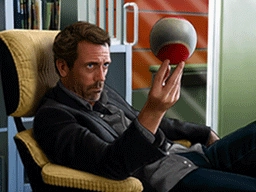 House (Nintendo DS) holding his ball and looking at it