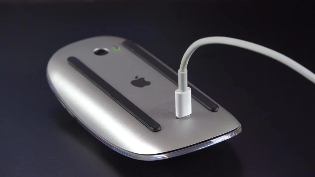 Apple Magic Mouse flipped upside down so it can be plugged in